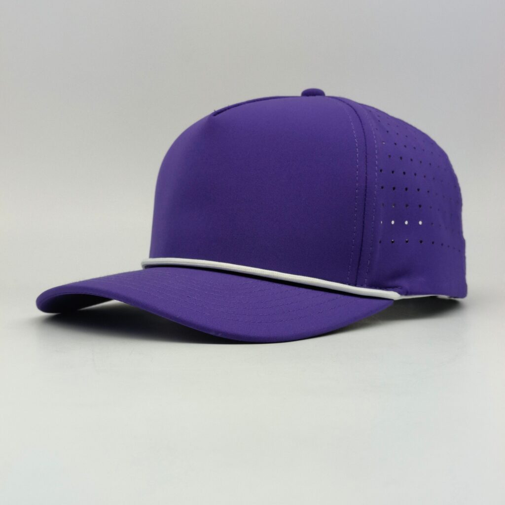 Purple Jones Headwear hat with a curved bill, white rope trim, and perforated side panels.